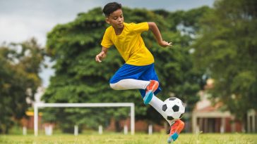 Kid playing football